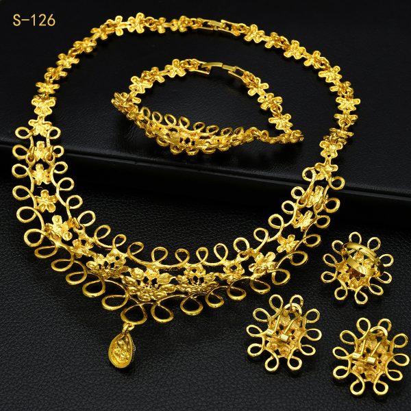 Second image of four-piece necklace earrings bracelet ring jewelry set