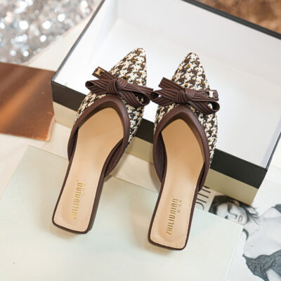 Women Wear Mueller Slippers