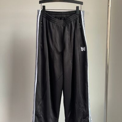Needles sports pants for men and women